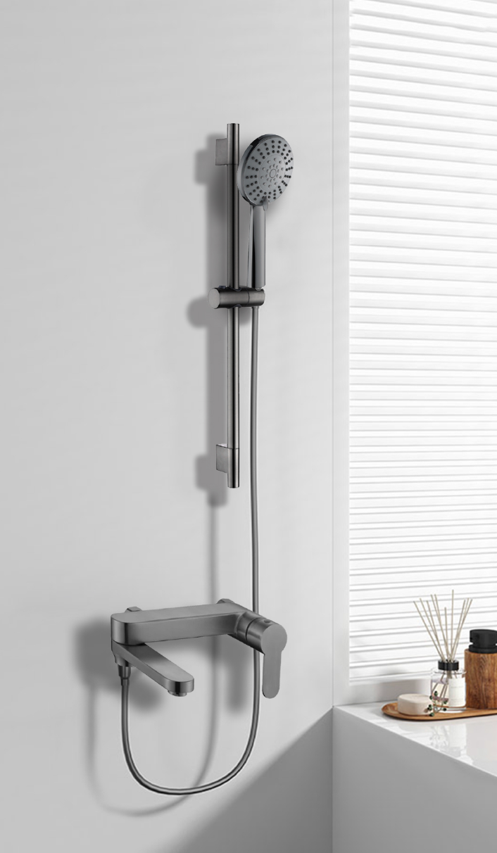 Gun Metal Finish shower system mounted on a white wall with gun metal bath mixer
