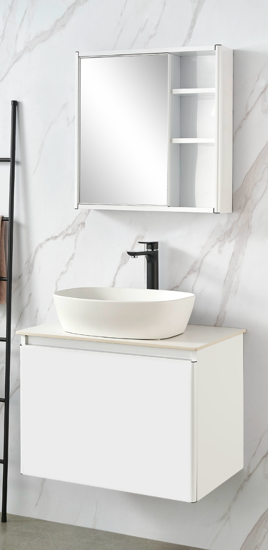 Bathroom vanity with white sink and mirror against a marble-patterned wall.