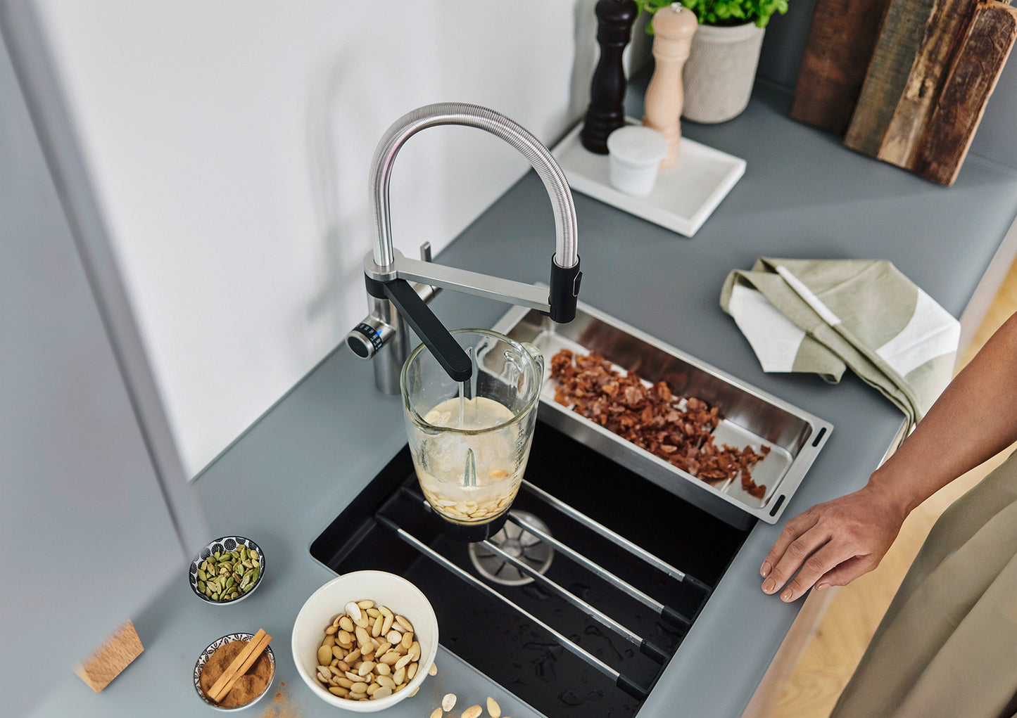 BLANCO Evol-S Pro Filter filling up a cup with filtered water