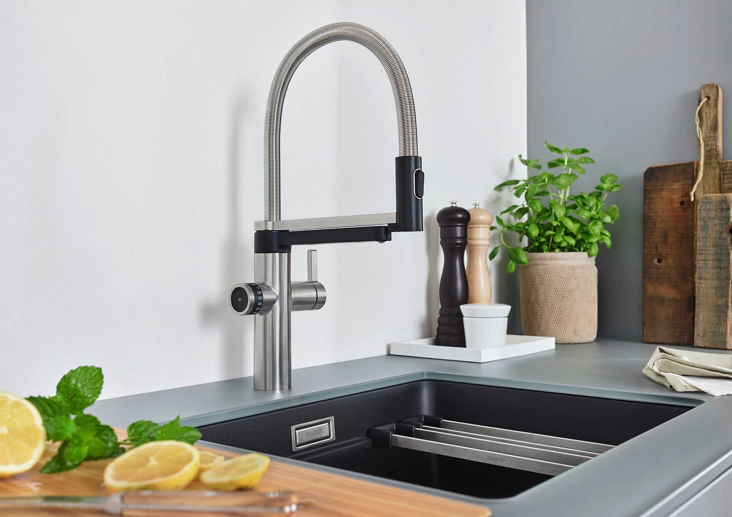 Modern kitchen sink with a BLANCO Evol-S Pro Filter kitchen mixer