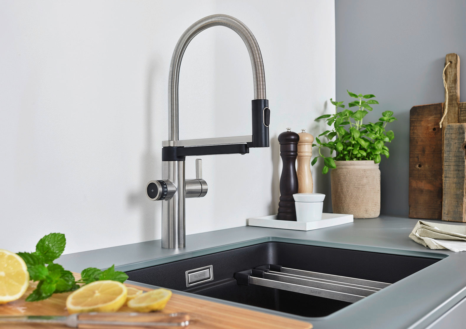 Modern kitchen sink with a BLANCO Evol-S Pro Filter kitchen mixer