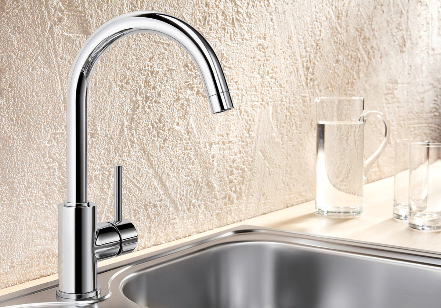 High-resolution shot of the BLANCO Mida in Chrome, showcasing its small footprint, on a kitchen counter top