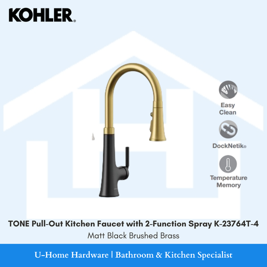 Front view of the KOHLER Tone pull-out kitchen faucet K-23764T-4 featuring a striking two-tone Matt Black base and Brushed Brass spout, displaying its easy-clean 2-function sprayhead.